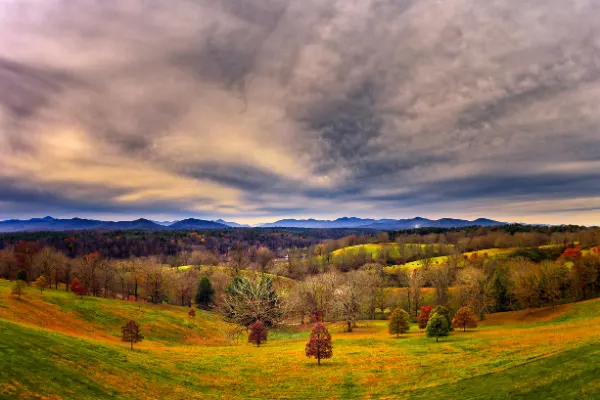 Fall Hiking Trails Near Asheville Biltmore with view of fall trees from the loggia
