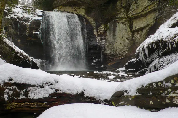 Living in Asheville NC In The Winter Looking Glass Falls with snow and ice