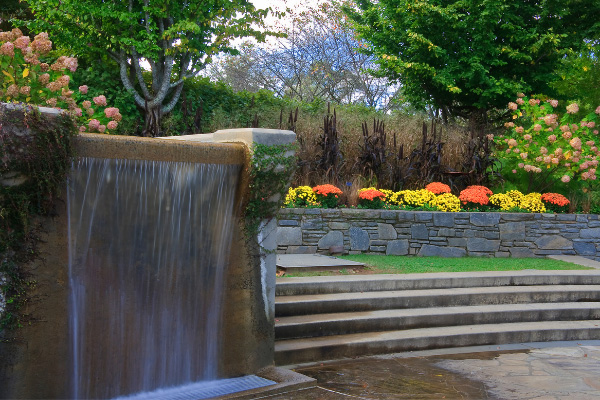 Best Hiking In Asheville North Carolina Arboretum with steps, flowers, and fountain