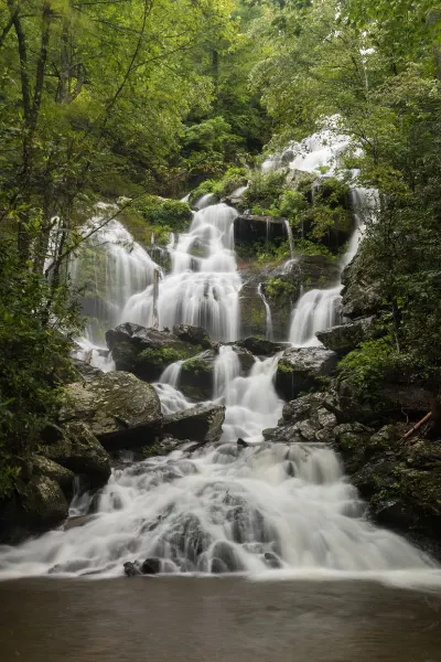 Catawba Falls Near Asheville NC with cascading multiple-tiered waterfall with greenery
