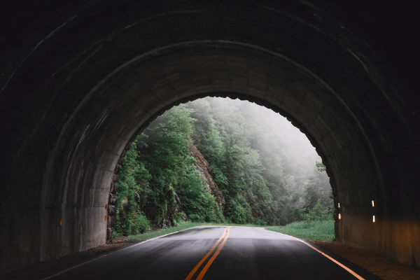 Blue Ridge Parkway Asheville North Carolina car tunnel, two-lane road, fog