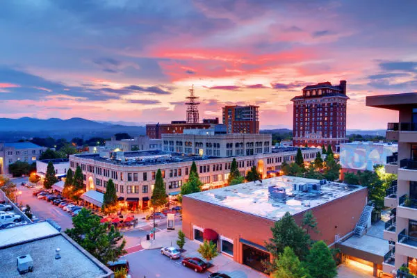 Historic Downtown Asheville North Carolina with Grove Arcade at sunset