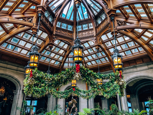 Biltmore Estate Christmas Asheville NC with entry room decorated with garland