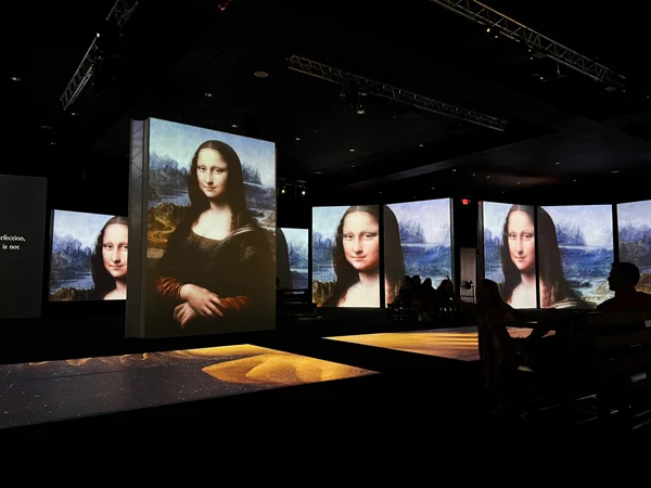 Leonardo da Vinci Exhibit Biltmore Asheville NC with Mona Lisa projected on massive floor to ceiling screens