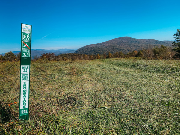 Trombatore Trail End Blue Ridge Pastures with sign and mountains