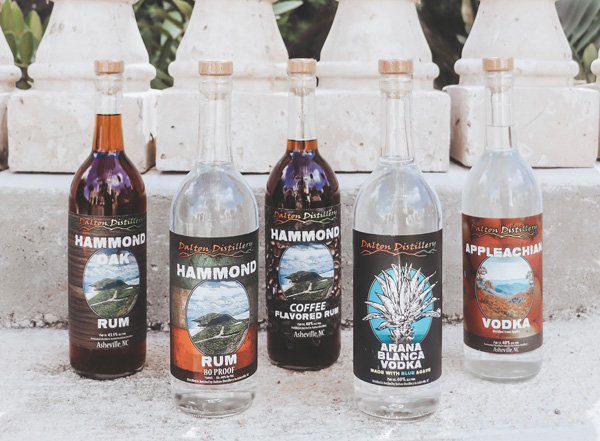 Dalton Distillery Asheville with bottles of rum, coffee-flavored rum, and vodka