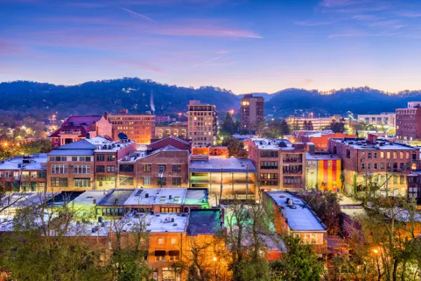 Best Asheville Neighborhoods Downtown cityscape at night