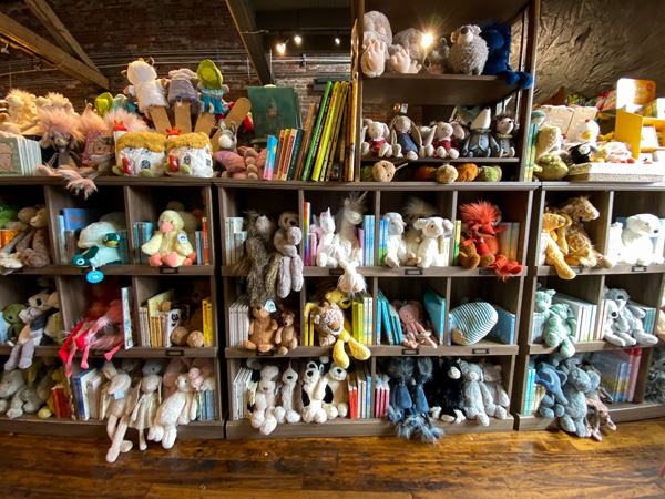 Sassafras On Sutton Books and toys in Black Mountain with shelf full of children's plushes and books