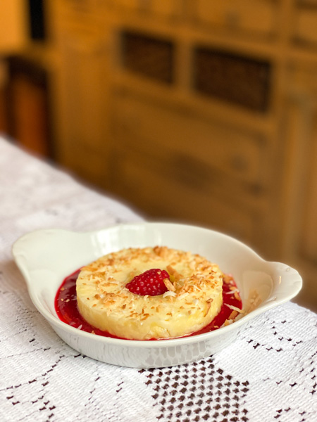 The Inn Around The Corner Breakfast with pineapple on top of red jam