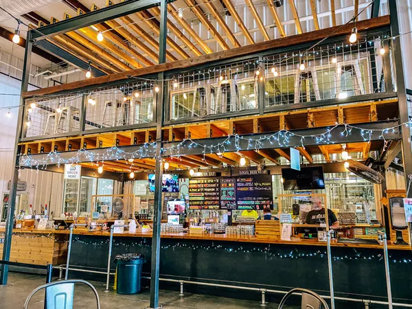 Bold Rock Cidery Taproom Mills River NC with large bar area with cidery taps and ordering station