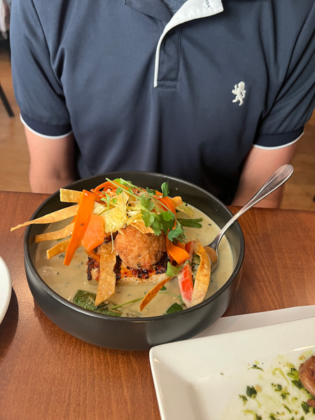Tom with vegan entree at Plant