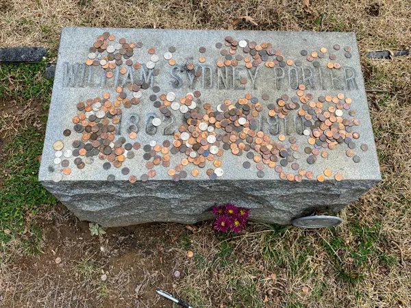 William Sydney Porter O. Henry Gravestone at Riverside Cemetery with pennies on top