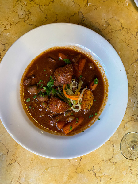 Bowl of beef stew at Bouchon