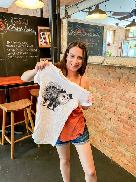 Christine with Izzy's Coffee shirt