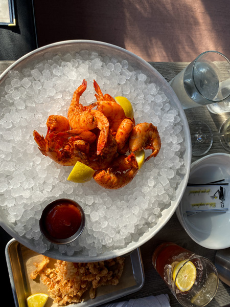 Jettie Raes Oyster House Asheville Shrimp cocktail over large bowl of ice