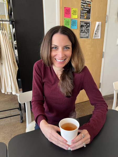 Christine with tea at Pollen Coffee & Flower Shop