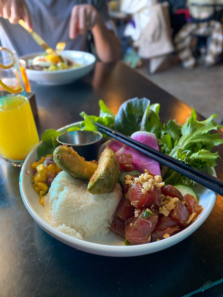 RosaBees Restaurant River Arts District Asheville NC with tuna poke with avocado tempura, coconut rice, and radishes with lettuce