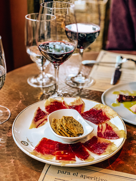 Asheville Gluten Free Charcuterie with red jamon and gluten free crackers at Curate