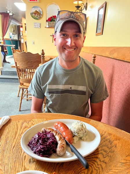 Tom with sausages at Berliner Kindl German Restaurant