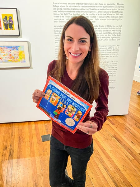 Christine with book at Black Mountain College Museum & Arts Center