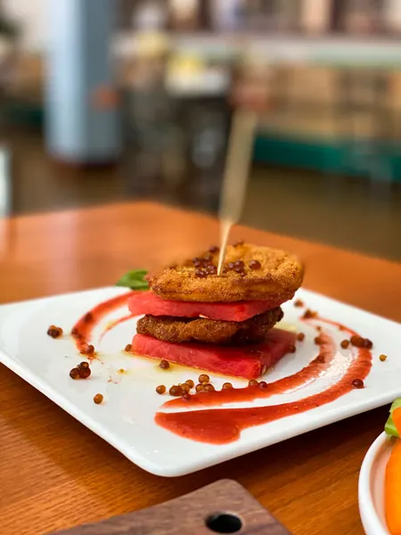 Gluten Free Fried Green Tomatoes Noble Cider on small white appetizer plate with watermelon