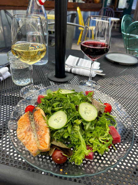 The Bush Farmhouse in Black Mountain, NC green lettuce salad with salmon, beets, tomatoes, cabbage, and cucumbers