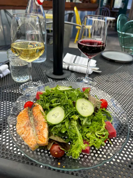 The Bush Farmhouse in Black Mountain, NC green lettuce salad with salmon, beets, tomatoes, cabbage, and cucumbers