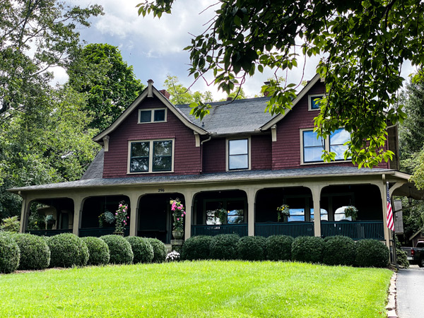 1900 Inn on Montford Asheville NC red house with front porch and driveway