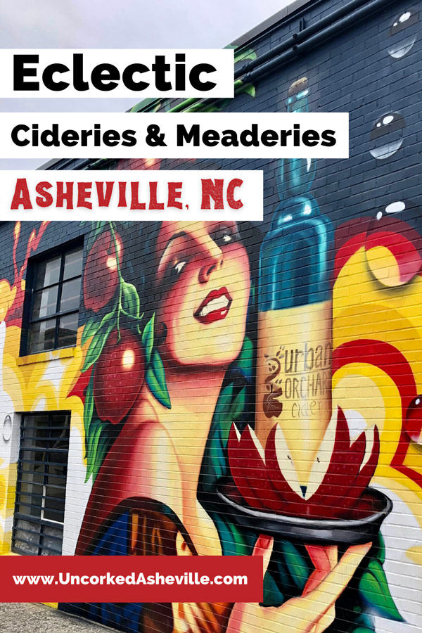 Best Cideries in Asheville NC pinterest pin with mural of woman serving bottle of cider on side of Urban Orchard in Downtown Asheville