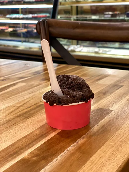 Asheville Chocolate Gelato vegan dark ice cream in pink cup on table