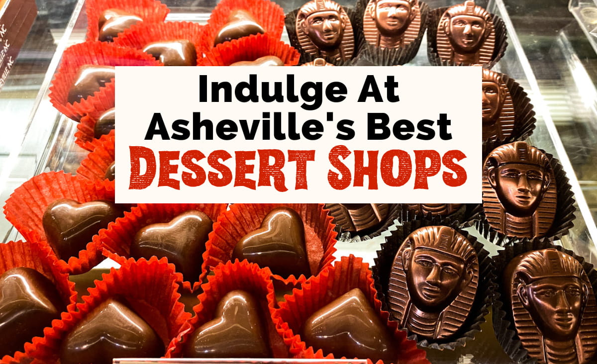 Indulge at the Best Asheville Dessert Shops featured image with chocolates in the shape of Egyptian Pharaohs and hearts from Downtown's Asheville Chocolate shop; hearts are in red paper and Pharaohs are in black paper