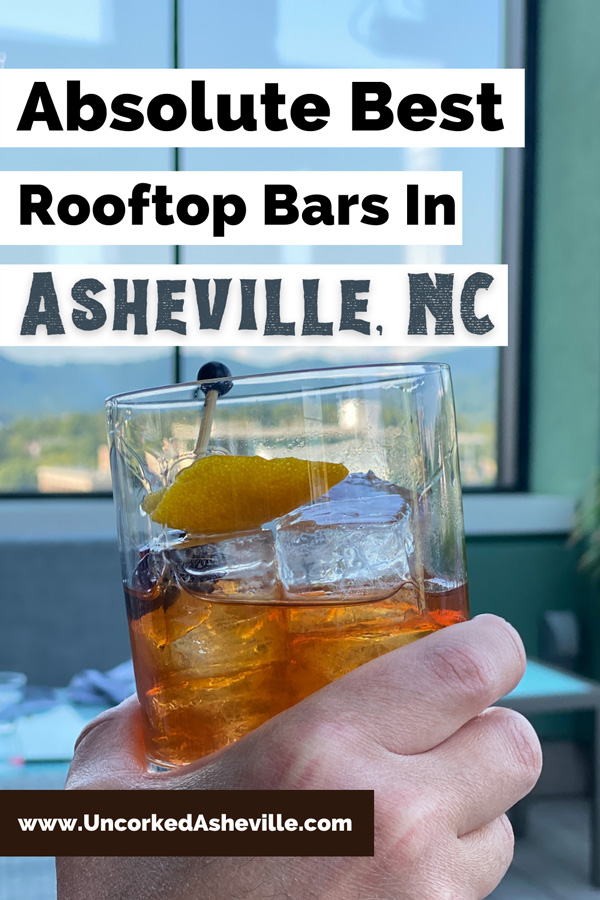 Best Asheville Rooftop Bars Restaurants Pinterest pin with Capella On 9 with white hand holding up an Old Fashioned Craft cocktail in front of window with view of Blue Ridge Mountains