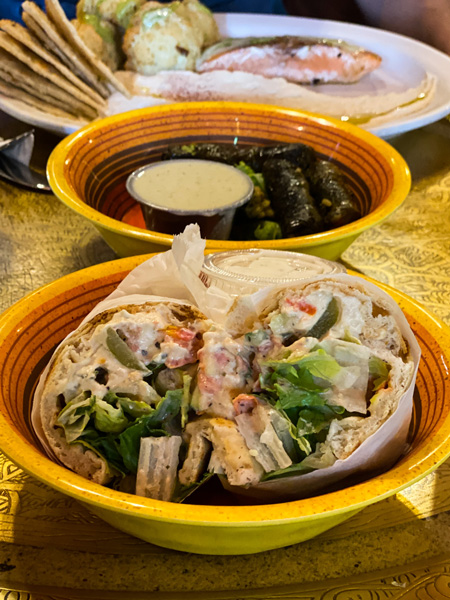 Jerusalem Garden Cafe Grape Asheville NC with chicken warp and bowl of grape leaves