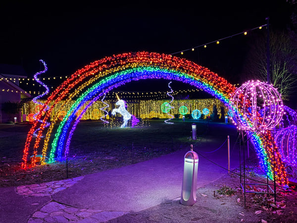 Unicorn and rainbow light display at The NC Arboretum's Winter Lights in Asheville