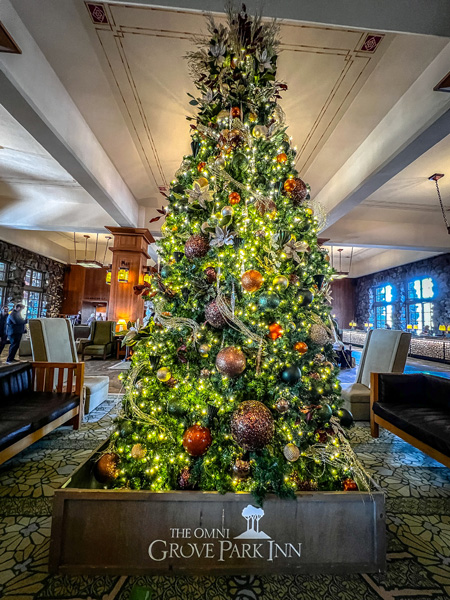 Large Christmas tree with ornaments and lights at The Omni Grove Park Inn in Asheville, NC