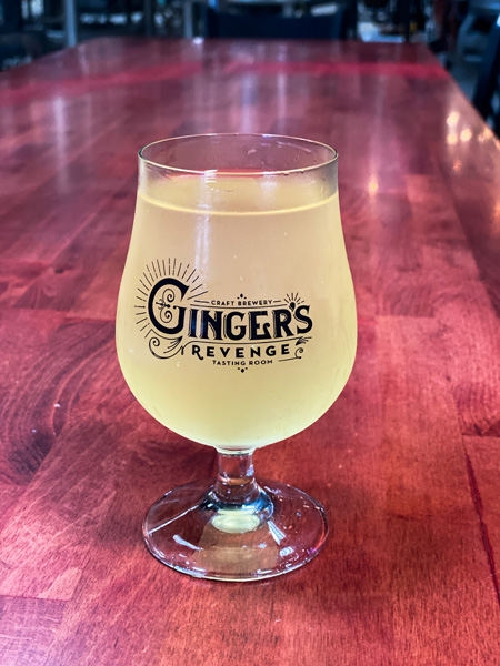 Ginger's Revenge RAD Asheville glass of light yellow ginger beer
