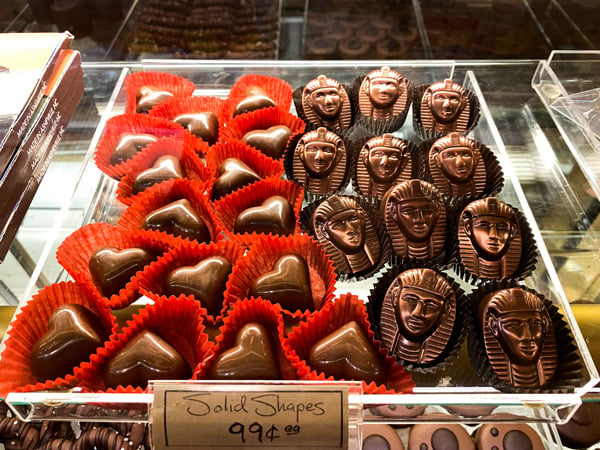 Asheville Chocolate Shaped Chocolate with chocolate hearts in red paper and chocolate Egyptian pharaohs