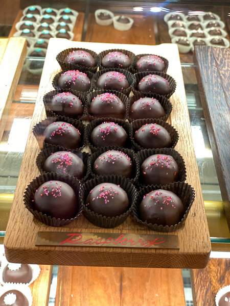 Asheville Chocolate Truffles with 18 dark chocolate truffles with pink sugar on top