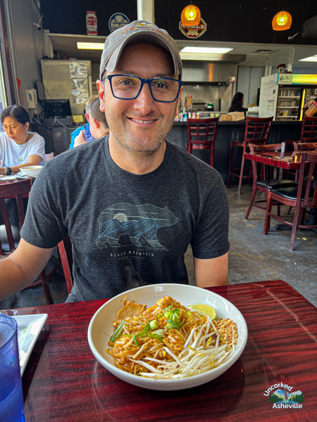 Bee Thai Kitchen Tom eating Pad Thai Asheville NC