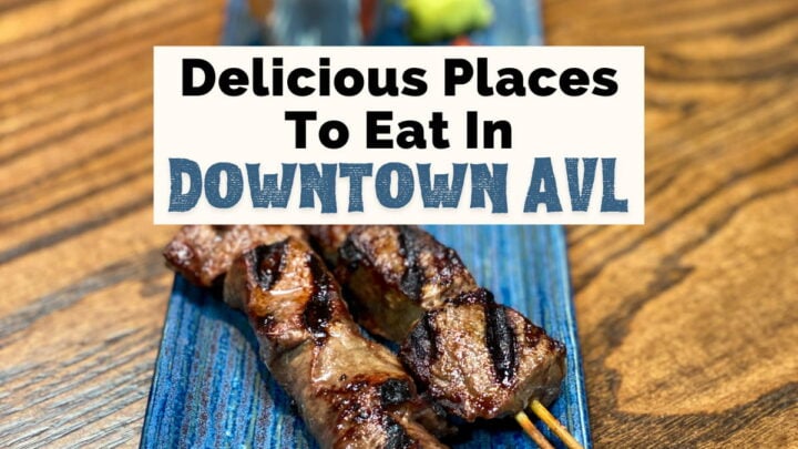 Downtown Asheville Restaurants And Places To Eat with beef skewers on blue plate with sauces from Ukiah Japanese Smokehouse