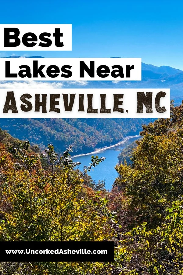 Best Asheville Lakes Pinterest pin with image of Lake Fontana in Bryson City with blue water from above surrounded by mountains covered with fall foliage and blue sky