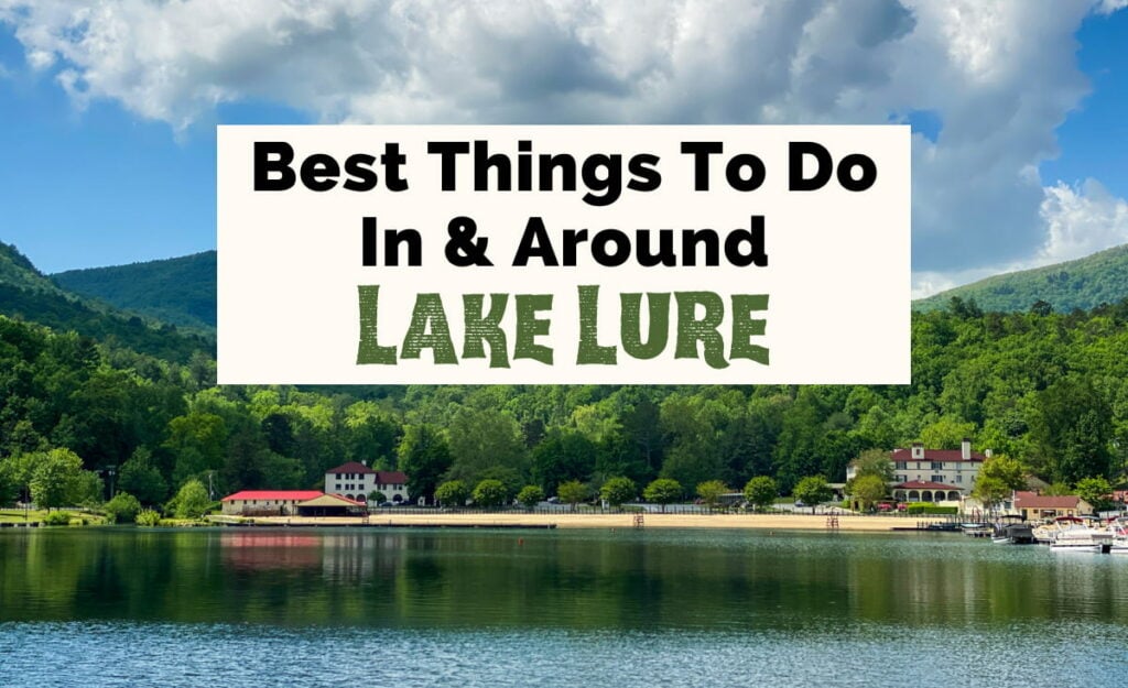 Things To Do In Lake Lure NC with image of blue and green lake with marina with boats, inn, Lake Lure beach, and blue and green tree lined mountains near Chimney Rock