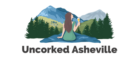 Uncorked Asheville NC logo Travel Site with sketch of white brunette woman looking out at Blue Ridge Mountains with white wine in hand