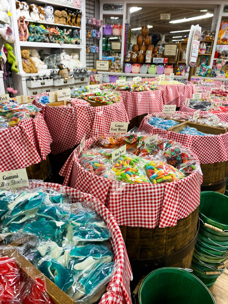 Mast General Store Waynesville NC with barrels with red and white cloth filled with sugar candies