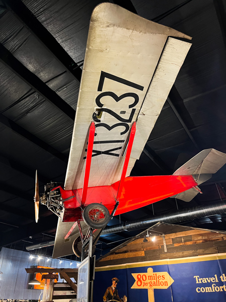 Wheels Through Time Maggie Valley NC Plane with red body and white wings with number