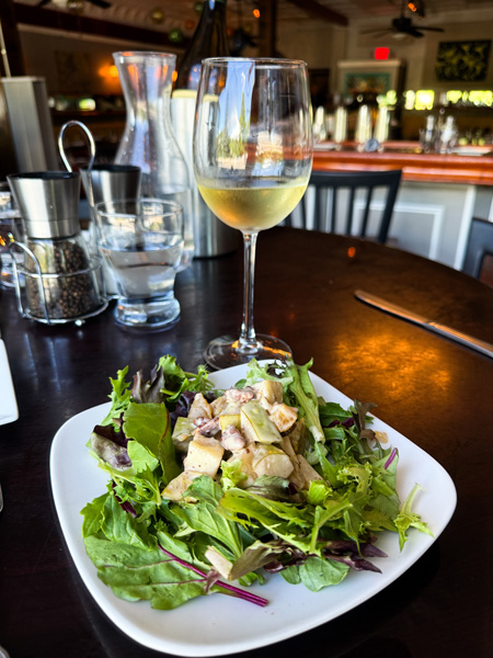 Glass Onion salad and wine