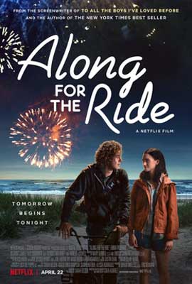 Along for the Ride Film Poster with two people in coats on sandy pathway along the ocean with fireworks in the sky