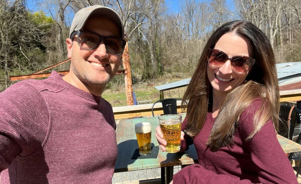 Gluten Free Beer Asheville Featured image with selfie of Christine and Tom