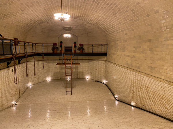 Biltmore Estate Indoor Swimming Pool with image of lit and empty pool interior