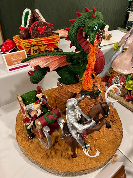 Omni Grove Park Inn Gingerbread House competition in Asheville with dragon and knight scene made completely from gingerbread